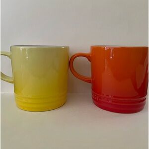 Two - LE CREUSET Coffee Mugs. Soleil yellow and Flame Orange.